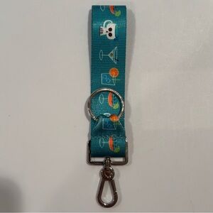 Harvey’s Seatbelt Shag Cocktail Click N Go Keychain / pre-owned / cross posted